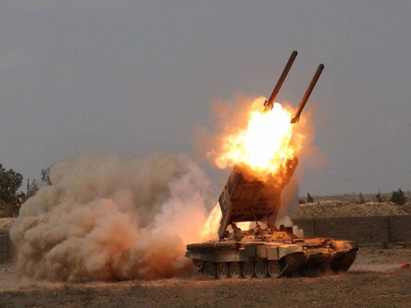 Iraqi security forces launch rockets against ISIS