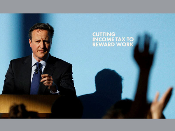Britain's Prime Minister David Cameron answers questions