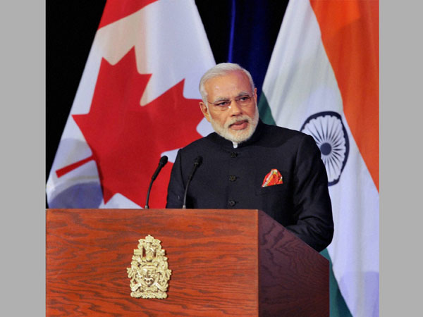 Prime Minister Narendra Modi addressing the guests