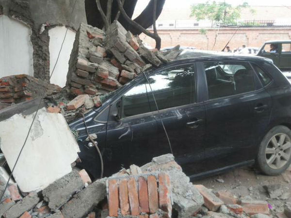 Vehicles damaged in building collapse