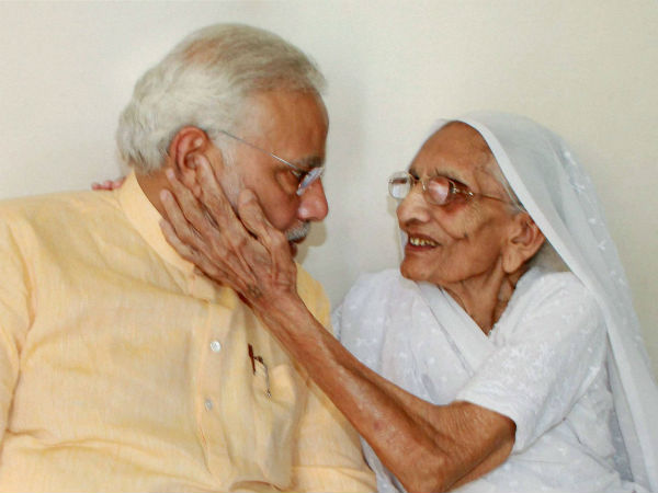 Modi being blessed by his mother