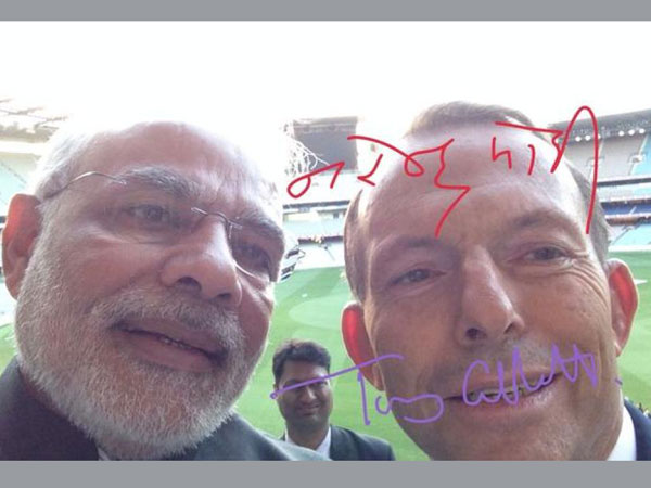 Narendra Modi and Tony Abbott smile for the camera