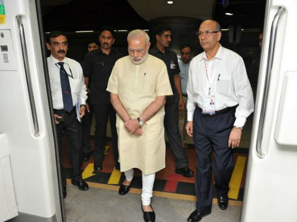 PM Modi boards metro train at Janpath PM Modi boards metro train at Janpath