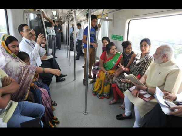 PM interacts with commuters travelling in metro PM interacts with commuters travelling in metro