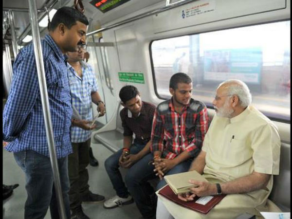 PM Modi interacts with commuters PM Modi interacts with commuters