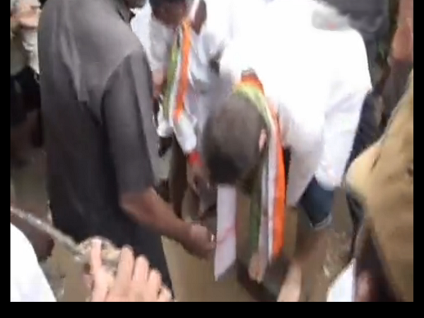 Congress sycophancy? Veteran party leader V Narayansamy holds slippers for Rahul Gandhi