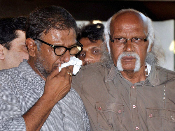 Chintan Upadhyay, husband of Hema Upadhyay attends her funeral at Kandivali in Mumbai on Monday. 