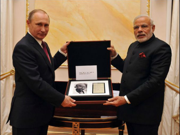 President Putin gifts a page from Gandhi ji's diary to PM Modi President Putin gifts a page from Gandhi ji's diary to PM Modi