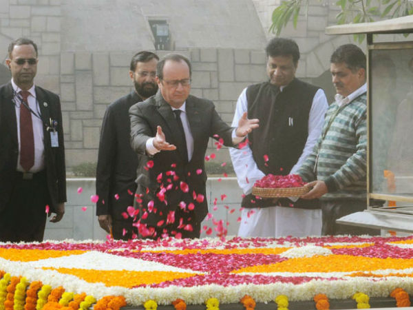 Visiting French President pays floral tribute at Rajghat