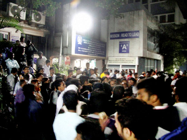 Relatives gather outside Pune college Relatives gather outside Pune college