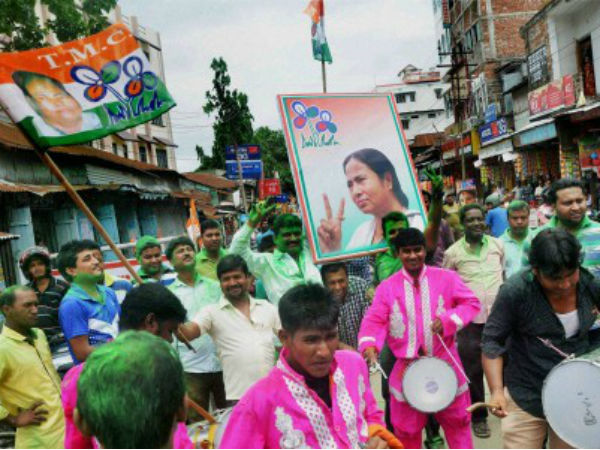 TMC supporters celebrate the party's win in WB polls