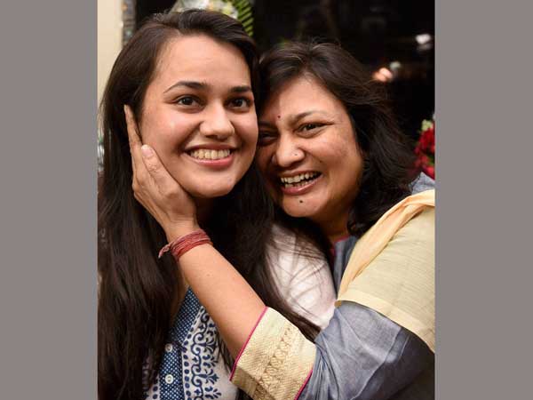 Tina with mother Tina with mother