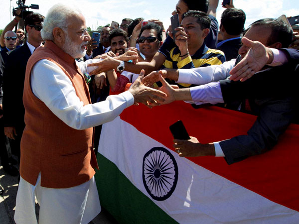 PM Modi meets Indian community people on his arrival
