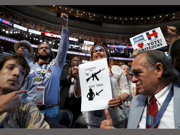 Delegates seek control of guns