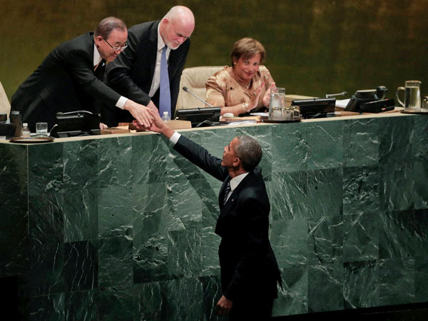Obama greets Ban-Ki moon, Peter Thomson at UNGA