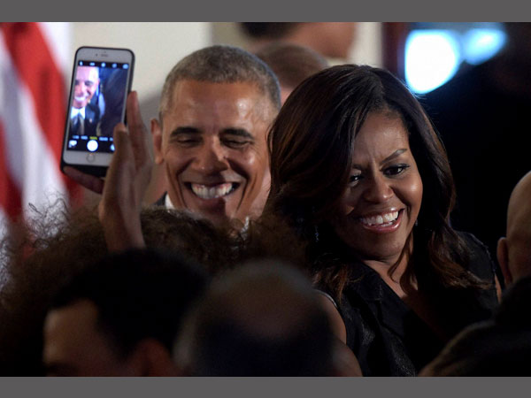 The Obamas are all smiles
