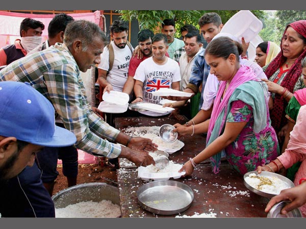 Meal being served at a relief camp