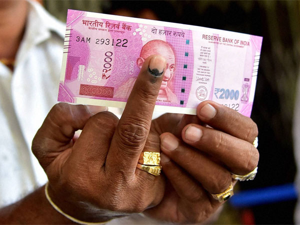 Bank customer displays indelible ink