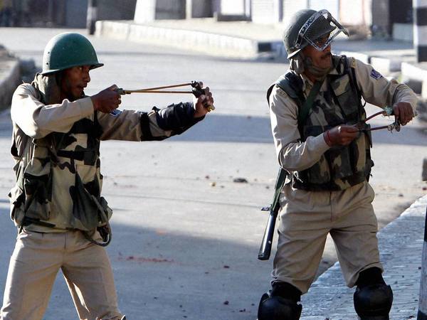 Security forces using slingshots