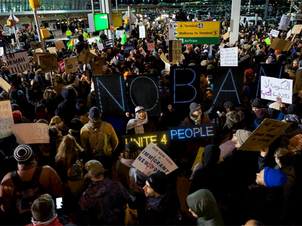 Protesters assemble at John F. Kennedy International Airport in New York to protest Trump's immigration order. Protesters assemble at John F. Kennedy International Airport in New York to protest Trump's immigration order.