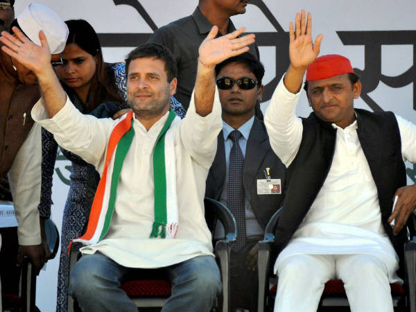 Congress Vice President Rahul Gandhi and UP Chief Minister Akhilesh Yadav waving to the crowd at a public rally. Congress Vice President Rahul Gandhi and UP Chief Minister Akhilesh Yadav waving to the crowd at a public rally.