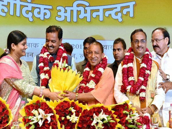 Sharma being greeted by party workers