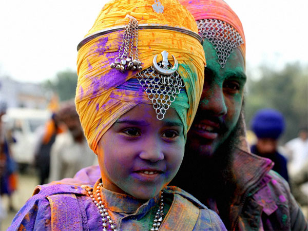 Sikhs participate in a parade at Anandpur Sahib on the occasion of Holla Mohalla. Sikhs participate in a parade at Anandpur Sahib on the occasion of Holla Mohalla.