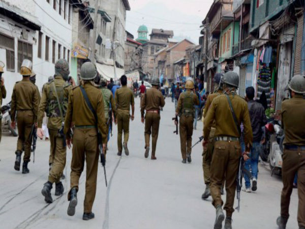 Men in khaki guard the streets