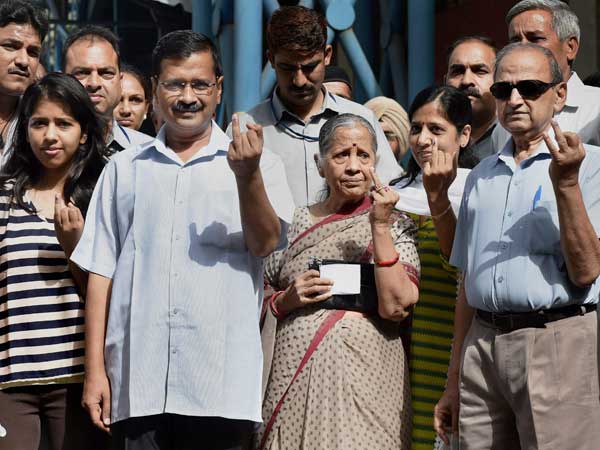 Delhi Chief Minister Arvind Kejriwal with his family after casting vote.
