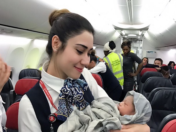 An air hostess holds baby in her hands in the Turkish Airlines on April 7. Photo credit: @TurkishAirlines/Twitter. An air hostess holds baby in her hands in the Turkish Airlines on April 7. Photo credit: @TurkishAirlines/Twitter.