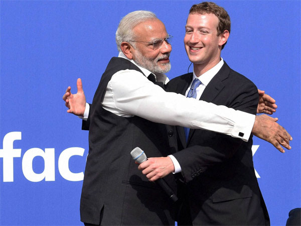 PM Modi hugs Facebook CEO Mark Zuckerberg