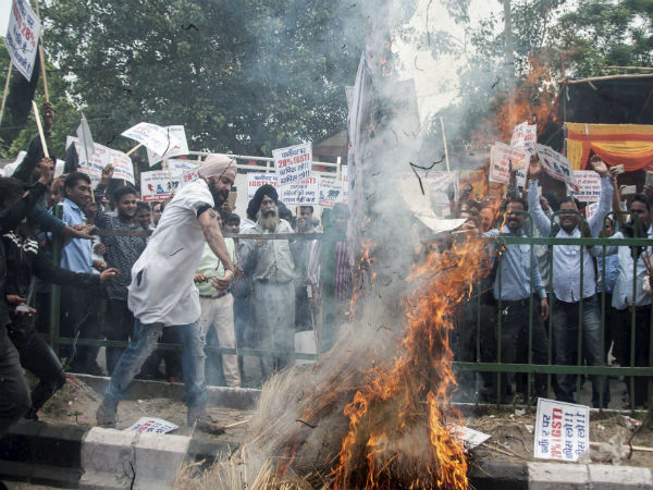 Textile traders stage a demonstration against GST