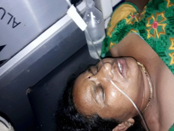 Woman being treated after the attack