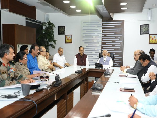 Modi and CM Rupani at the meeting