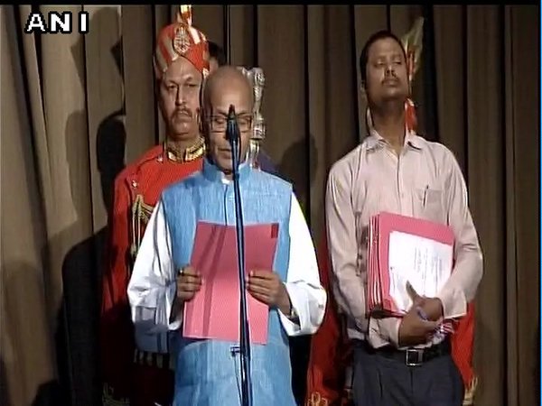 Kapil Dev Kamat being sworn-in
