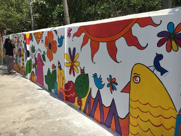 Beautifying a boring old wall