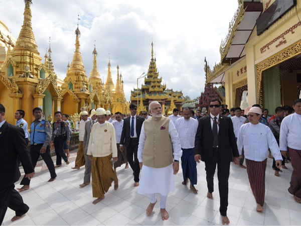 PM Modi visits 2500 yrs old Shwedagon Pagoda,considerd to be the pinnacle of Myanmar's cultural heritage. Courtesy: @MEAIndia PM Modi visits 2500 yrs old Shwedagon Pagoda,considerd to be the pinnacle of Myanmar's cultural heritage. Courtesy: @MEAIndia