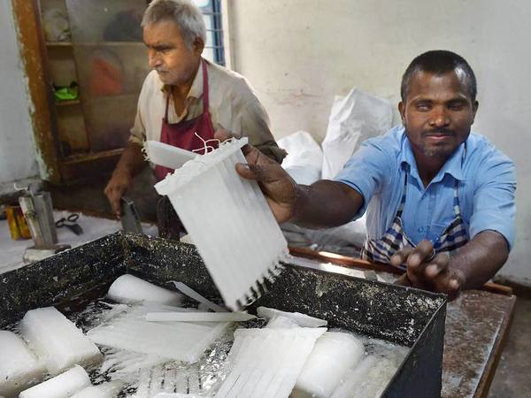 Packing candles for Diwali Bazaar 