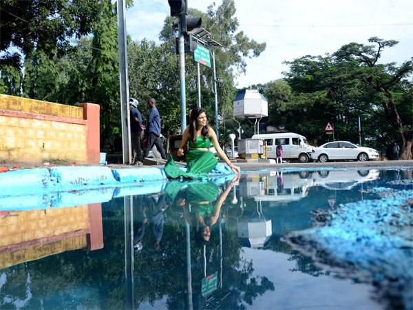 Mermaid in a pothole-pond
