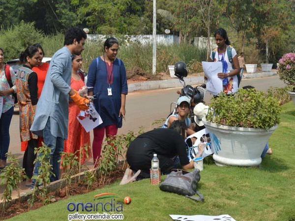 Youngsters painting the pots