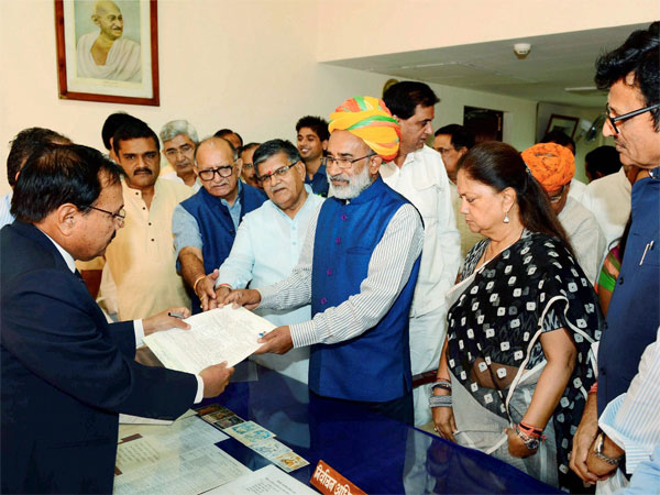 Union minister of state for tourism (Independent charges) KJ Alphons file his nomination papers for the Rajya Sabha in Jaipur on Monday. Rajasthan CM Vasundhara Raje is also seen. PTI Photo Union minister of state for tourism (Independent charges) KJ Alphons file his nomination papers for the Rajya Sabha in Jaipur on Monday. Rajasthan CM Vasundhara Raje is also seen. PTI Photo