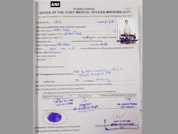 Sad but true: Woman carries husband on her back to get disability certificate Sad but true: Woman carries husband on her back to get disability certificate