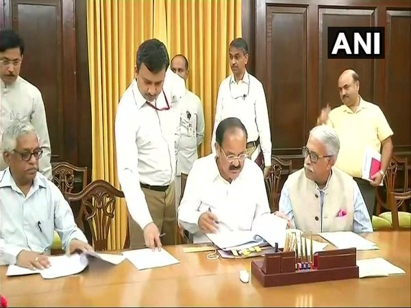 Naidu signing the papers of rejection of Impeachment Motion