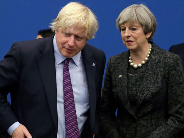British Prime Minister Theresa May talks with British Foreign Minister Boris Johnson British Prime Minister Theresa May talks with British Foreign Minister Boris Johnson