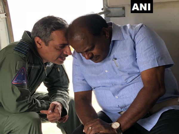Karnataka floods: Kumaraswamy conducts aerial survey of landslides, flood-affected areas in Kodagu Karnataka floods: Kumaraswamy conducts aerial survey of landslides, flood-affected areas in Kodagu