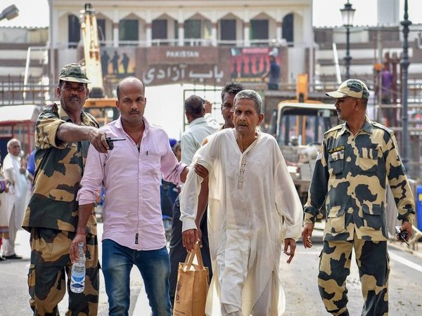 Sharma's wife Makhni Devi garlanded him