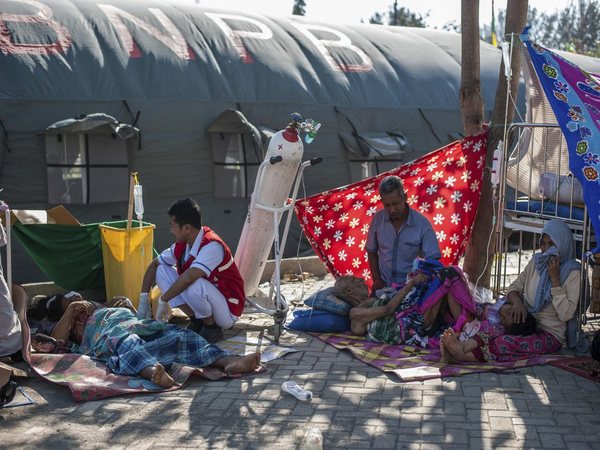 Paramedic attends to villagers 