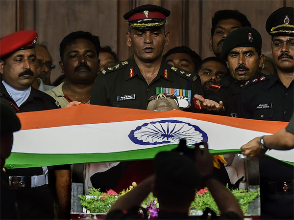 Karunanidhi draped in Tri-colour