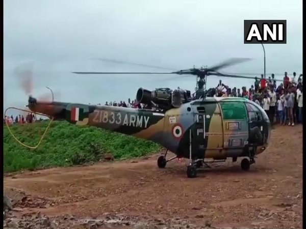 Army helicopter rescuing stranded people