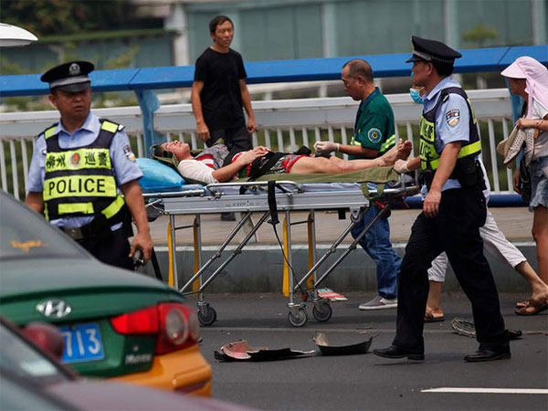 China: 9 killed as man goes on stabbing spree after ramming car into crowd China: 9 killed as man goes on stabbing spree after ramming car into crowd
